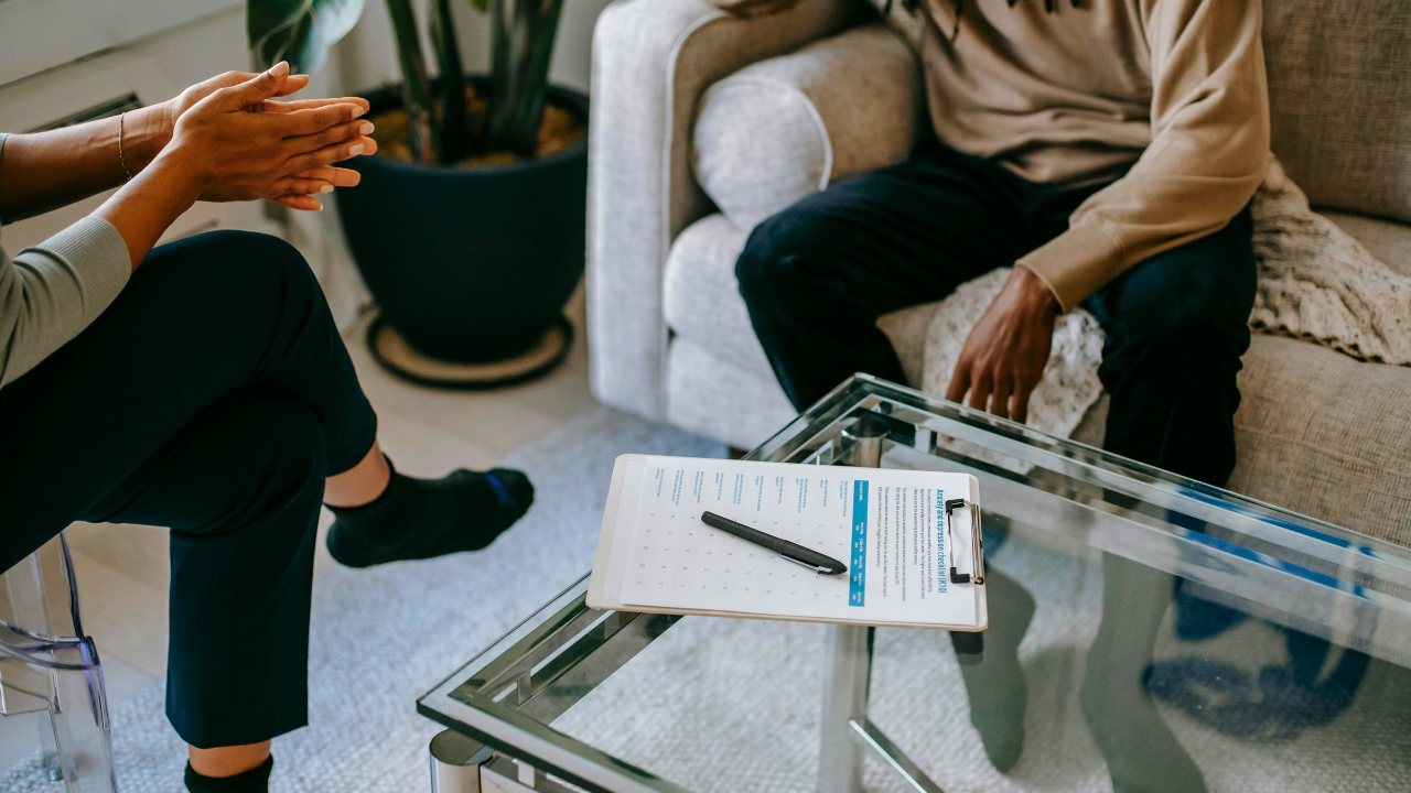 Therapist meeting with a client during a private counseling session