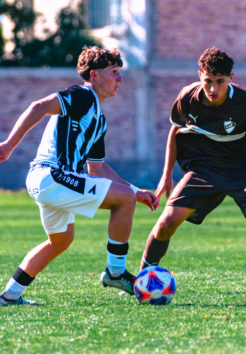 Elite youth soccer players competing during a match