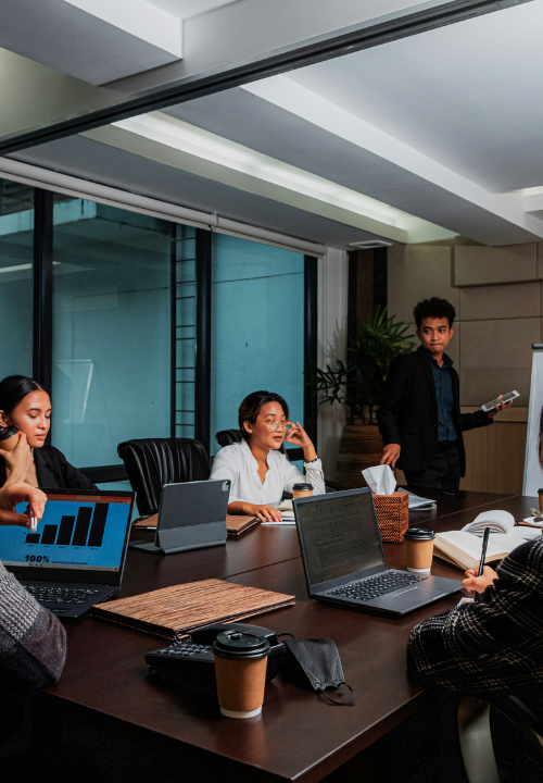 Business team collaborating during a meeting in a modern conference room